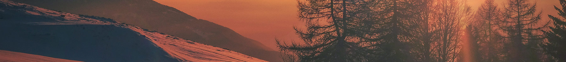 sunrise over snowy landscape