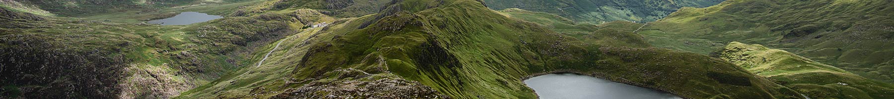 aerial photo over a mountainous area with lakes