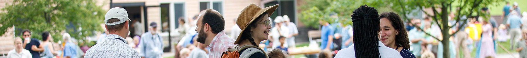 people talking and laughing together at a Plough Writers event