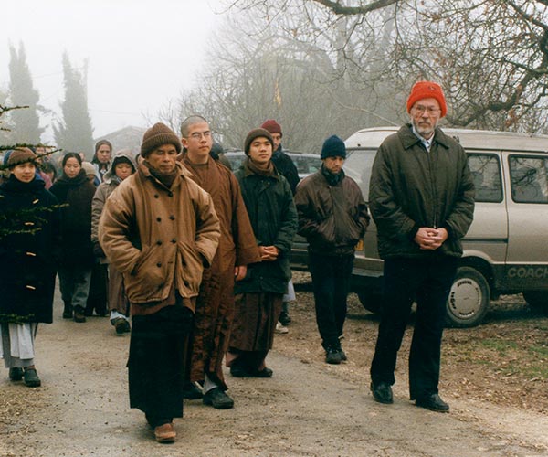 Thich Nhat Hanh walking with Johann Christoph Arnold