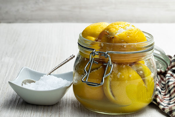 Salt-preserved lemons in a jar