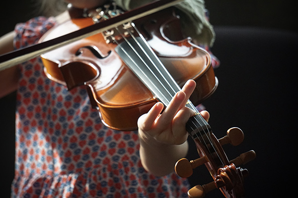 student playing violin