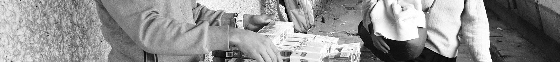 a man selling cigarettes