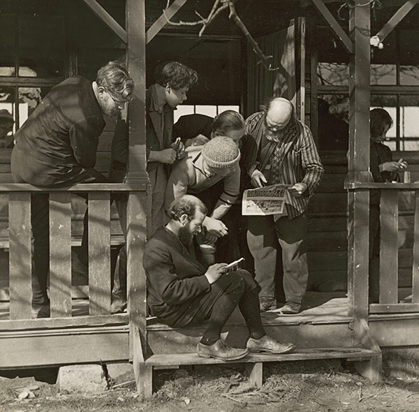 men reading a newspaper