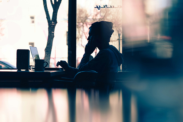 a man studying in a coffee shop