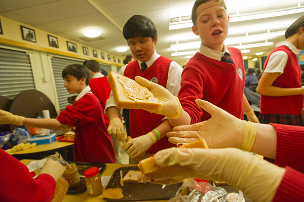 kids making peanut butter and jelly sandwiches