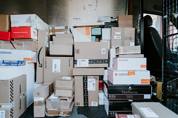 boxes on in the back of a delivery van