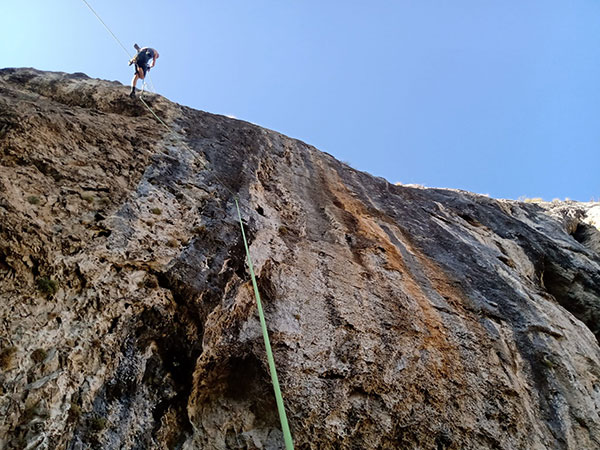 a man rock climbing