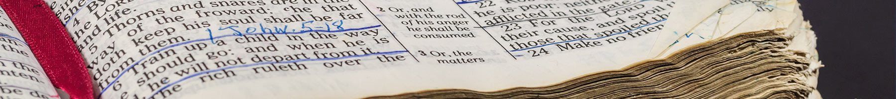 an open Bible lying on a table