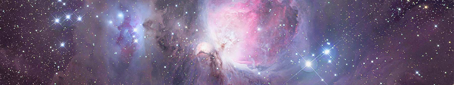 pink, blue, and purple swirls of light with scattered white stars: Orion Nebula