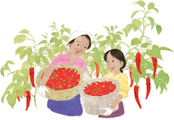 women carrying baskets of peppers