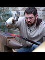 Michael Martin of RawTools working at an anvil