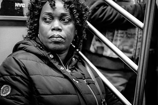 Woman on a train in New York City