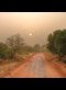 The sun shining on a dusty road in Africa