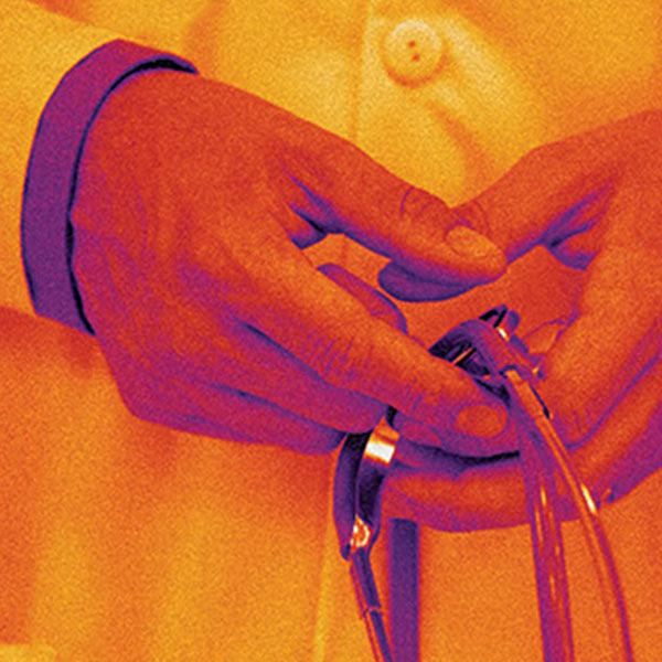 hands holding a stethoscope