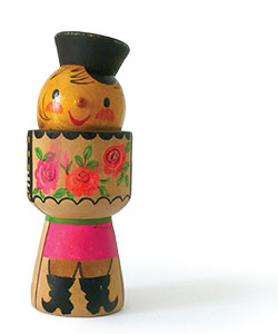 a small wooden painted toy