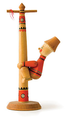 a small wooden painted toy