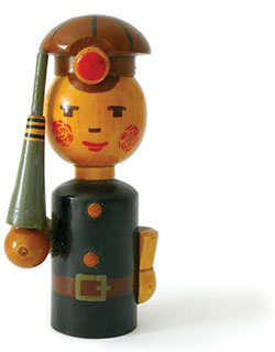 a small wooden painted toy