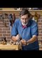 a carpenter working in his workshop