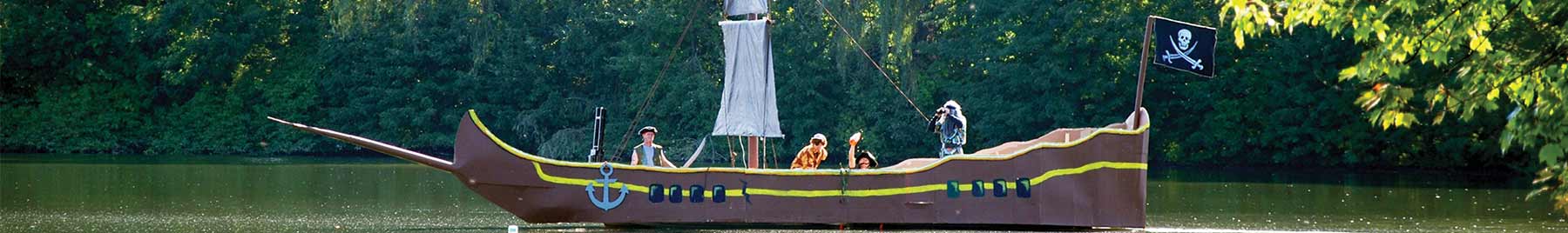 The children’s dads built the cardboard-hulled ship in a week of late evenings.