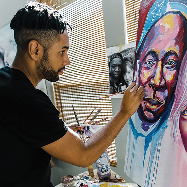 Brian Peterson painting a portrait