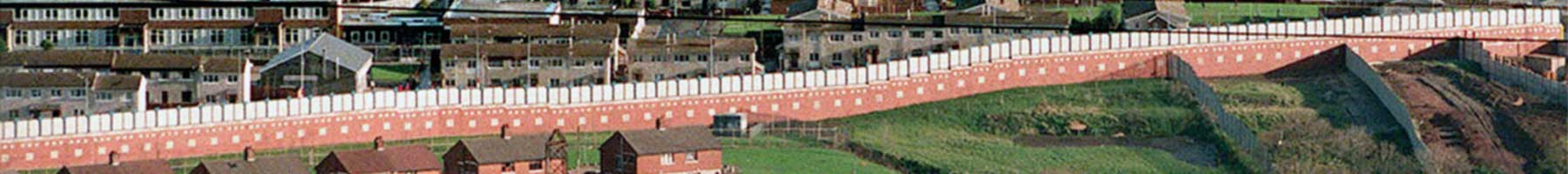 An aerial view of one of the “peace walls” separating Protestant and Catholic communities in Belfast. 