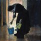 an elderly nun with a blue cleaning pail