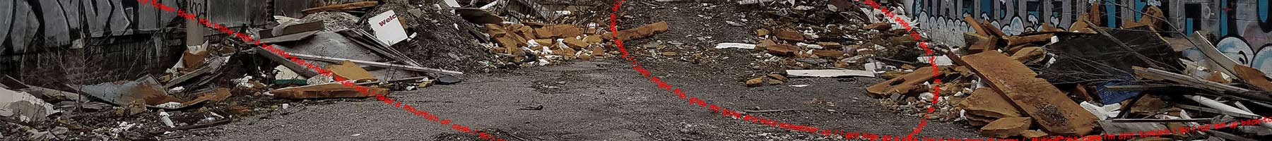 photo of a rubble filled alley with red text of a rap song overlaid