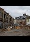 photo of a rubble filled alley