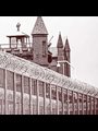 prison fence and security camera