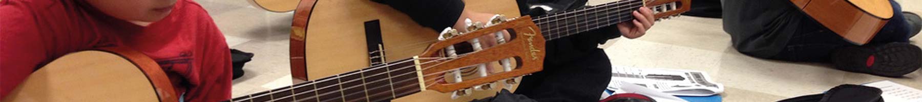 kids playing guitars