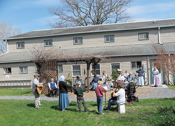 a family of musicians serenades elderly people during the 2020 Covid Lockdown