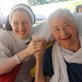 a religious sister and an elderly woman