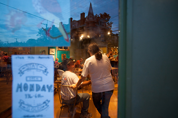 reflection of a street in a cafe window