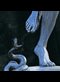 statue of a snake striking a foot