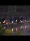 a community lantern walk near a lake