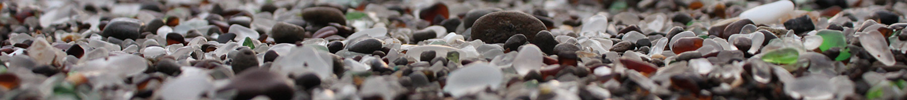 colorful pebbles by water