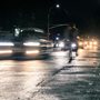 car lights on a dark wet road