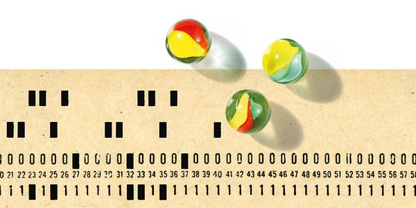 an IBM punched card with marbles
