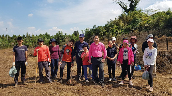 group of people posing for a photo