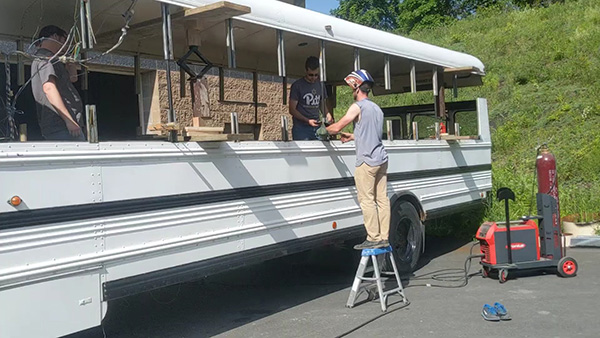 roof raising on an old bus