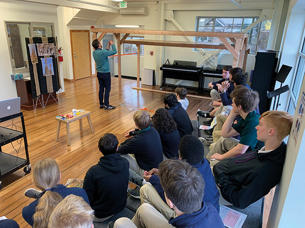 The author gives an architectural engineering demonstration to his students.